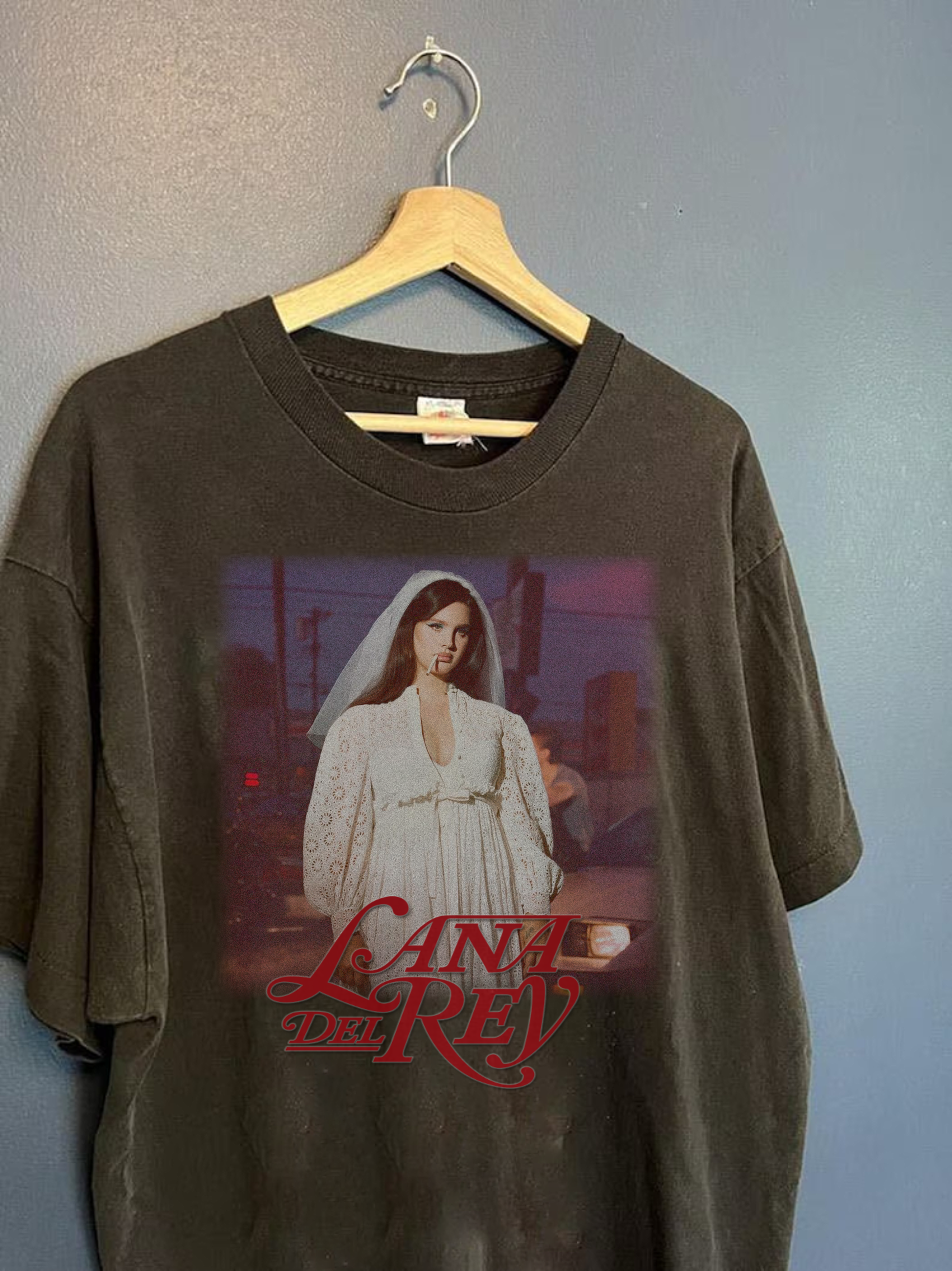 The 'LANA' Graphic T-Shirt, Handmade, hung up on coat hanger, front view, in black color way